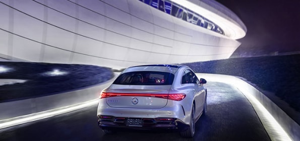 Mercedes-Benz EQ vehicle charging on the road