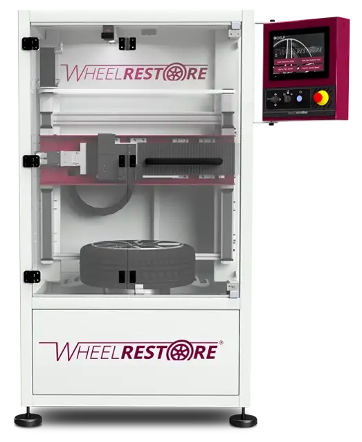 Diamond-cut milling machine refinishing an alloy wheel