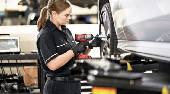 Mercedes-Benz technician servicing a vehicle